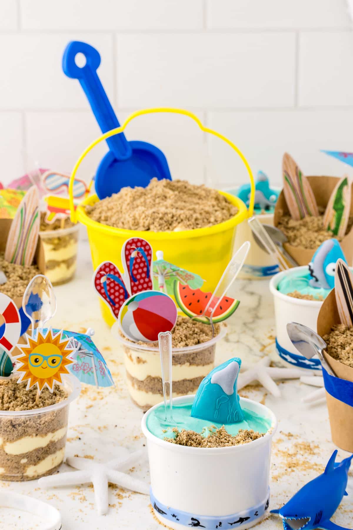 Sand pudding dessert cup ideas for a beach themed party.