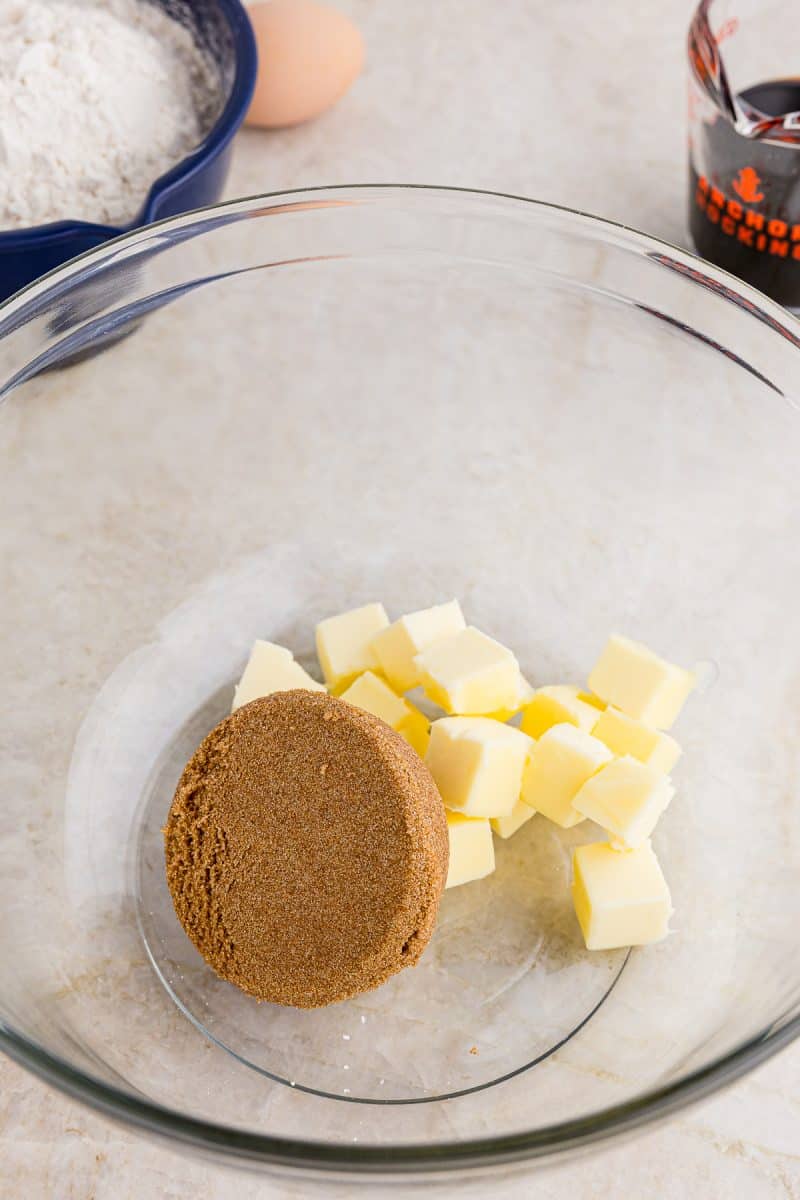 cubed butter and brown sugar in a glass bowl