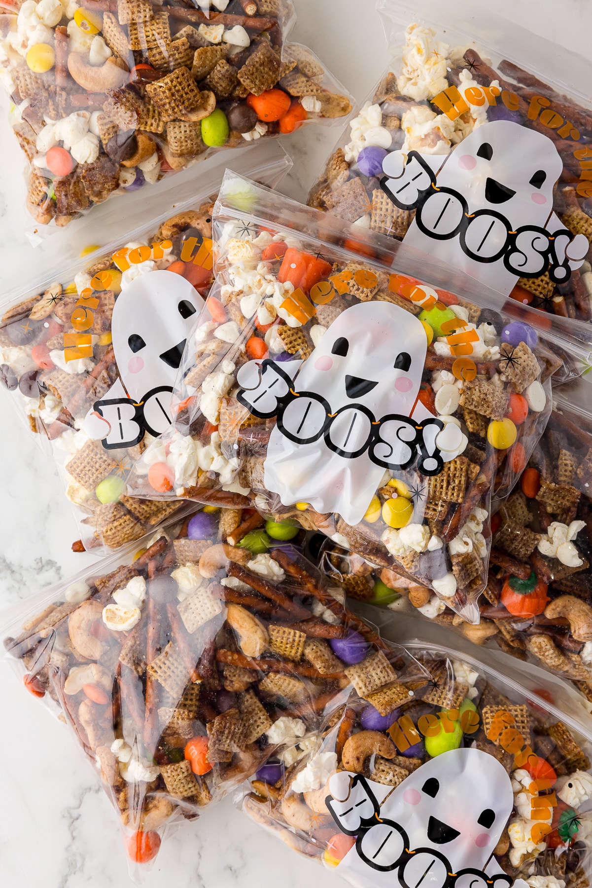 7 mini treat bags filled with halloween chex mix