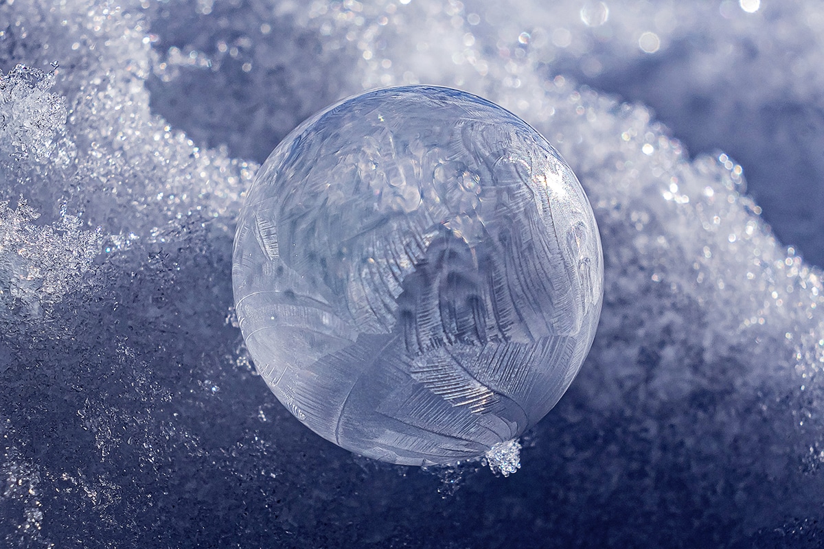 Frozen ice bubble in the snow