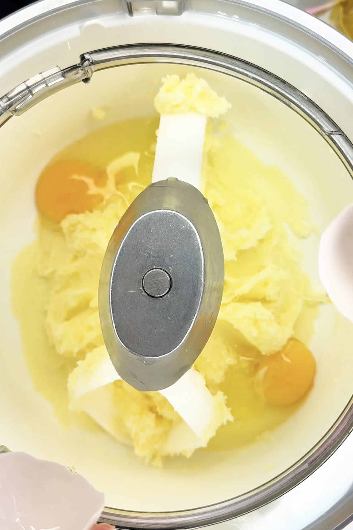 Sugar, butter and eggs in mixer