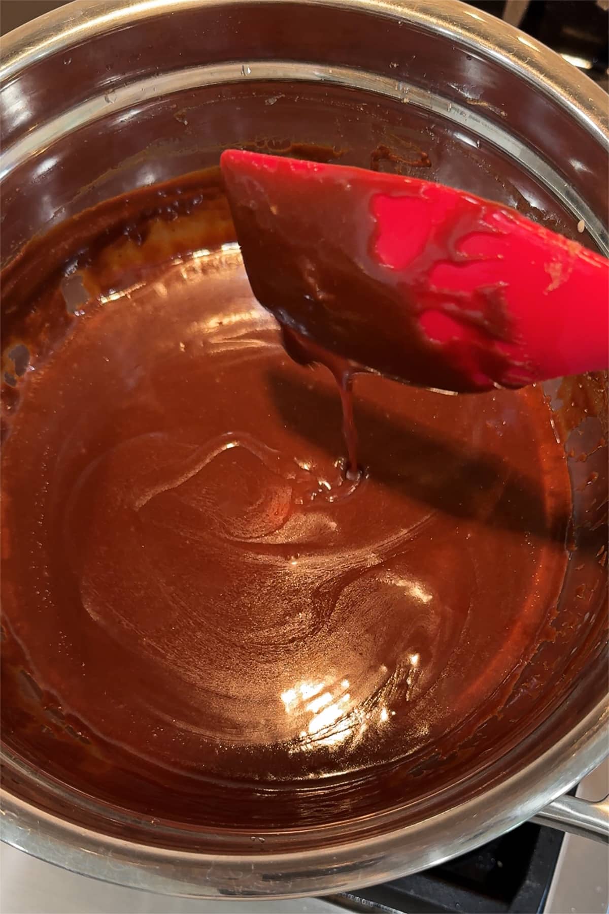 melted chocolate sauce in a double boiler