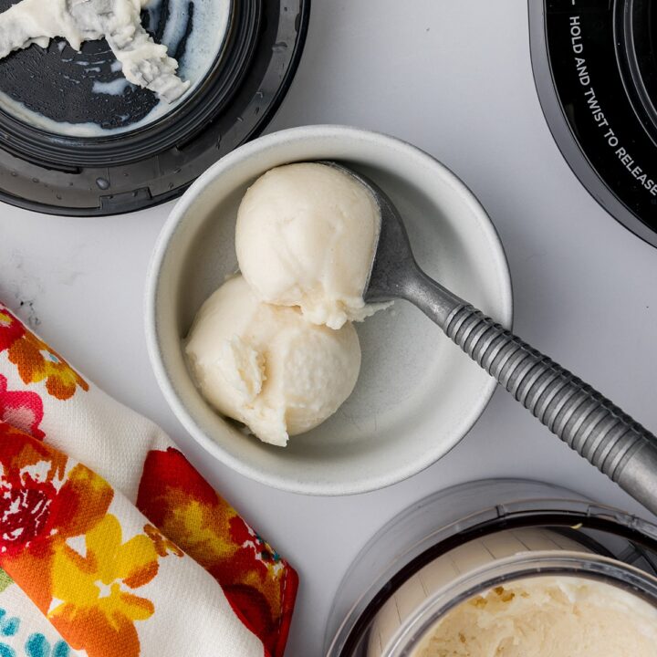 Bowl with scoops of vanilla ice cream and a colorful floral towel