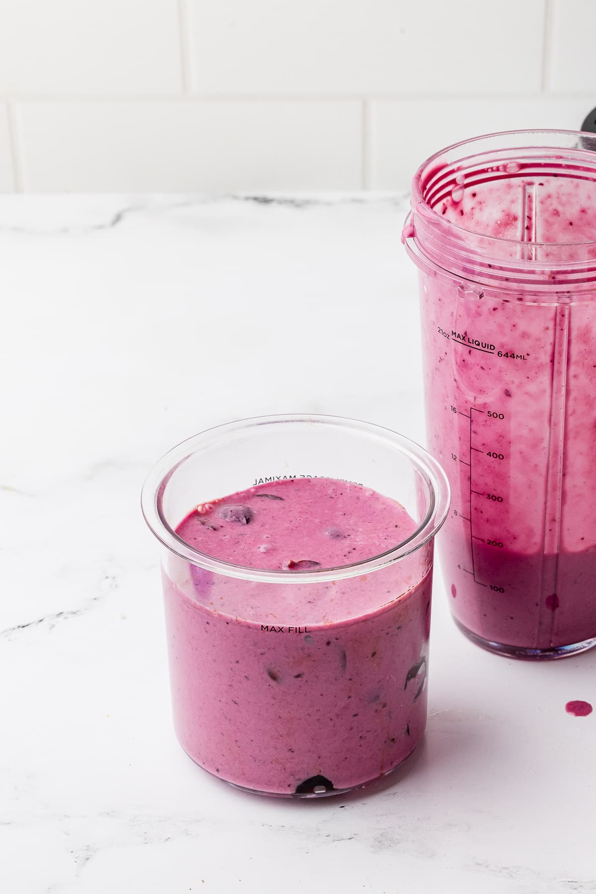 cherry ice cream mixture in a ninja creami pint jar