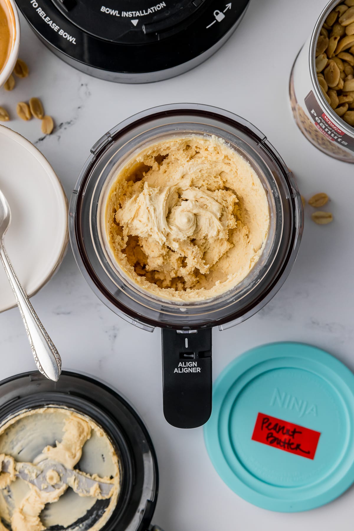 overhead shot of ninja creami peanut butter ice cream in the pint jar holder