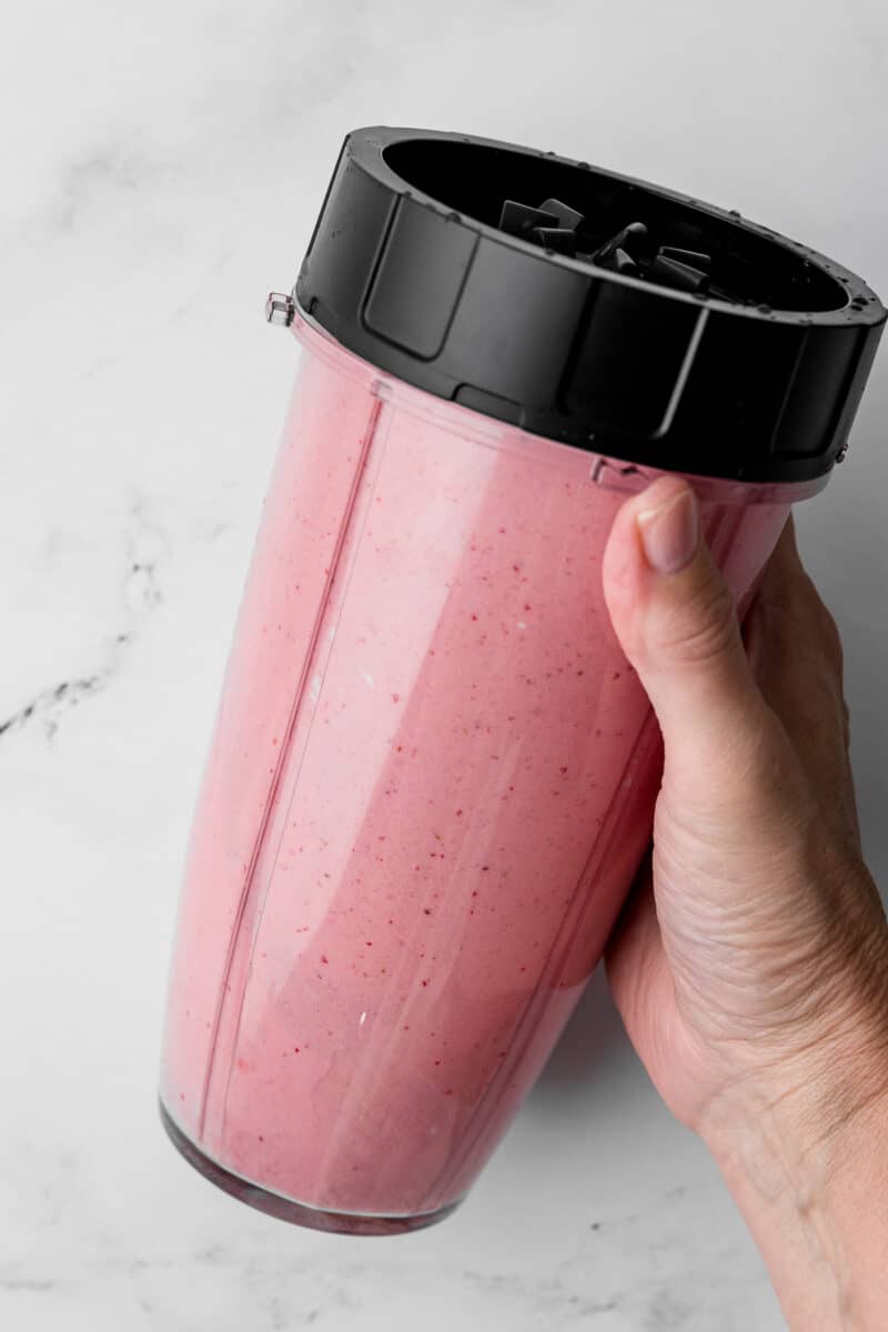 ninja blender with strawberry ice cream mixture