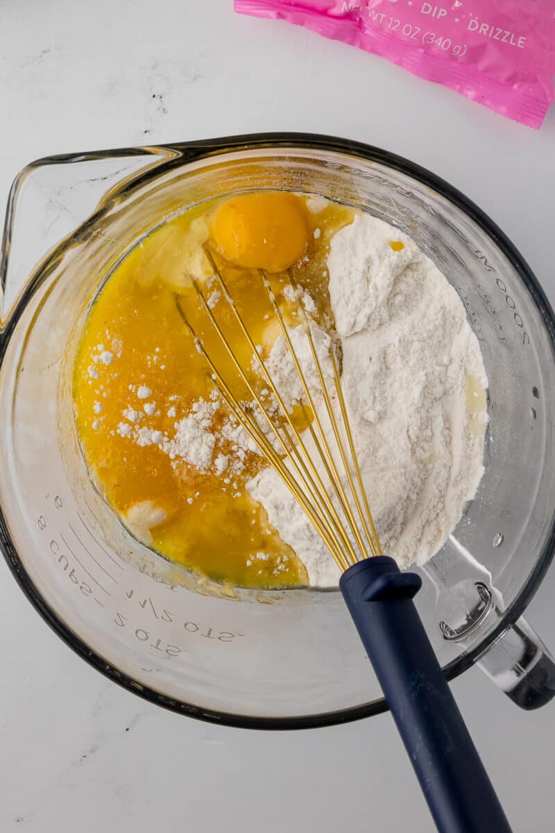 batter bowl filled with came mix, melted butter and eggs