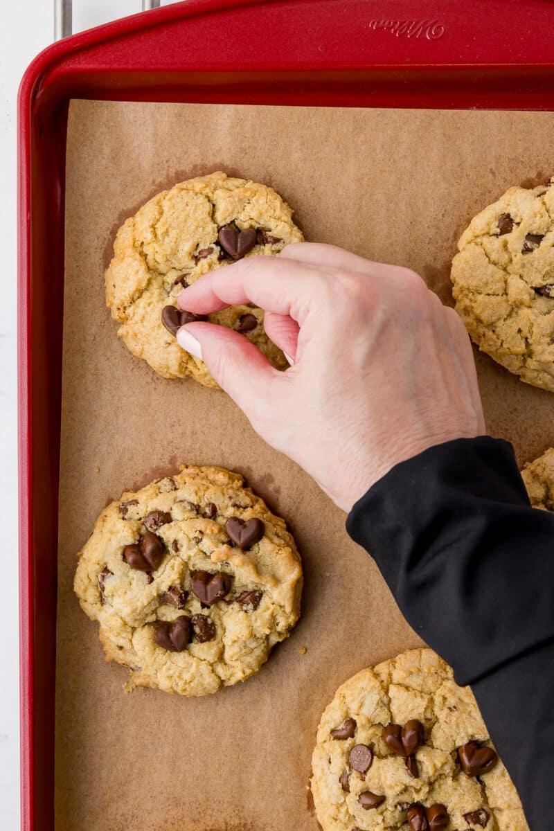 heart chocolate chips on a baked cookie