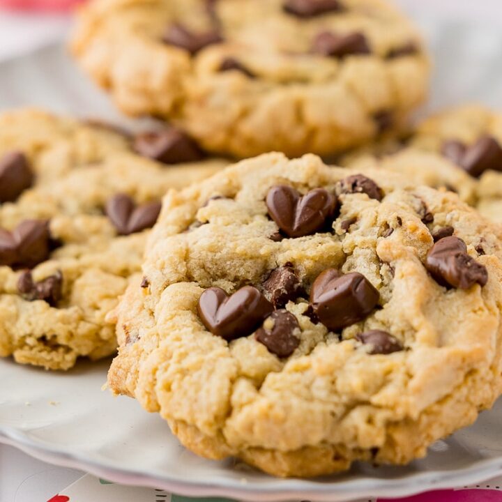 four chocolate chip cookies on a plate