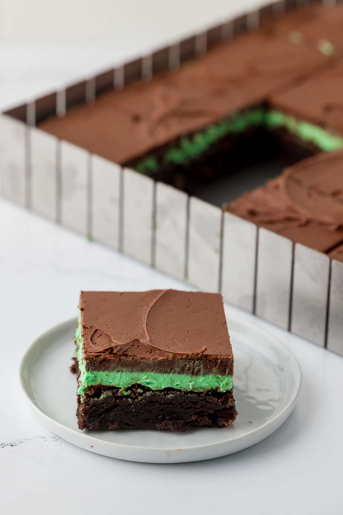 finished brownie on a white plate