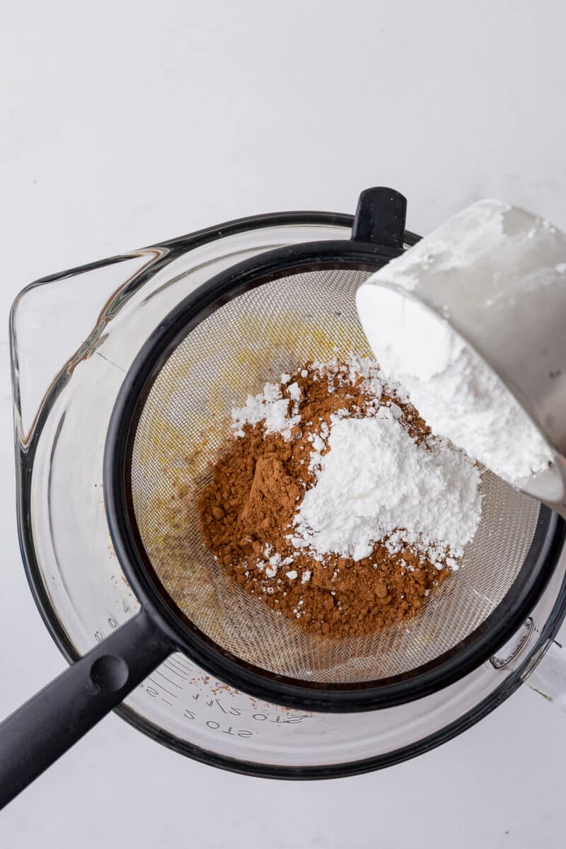 cocoa and powdered sugar in a strainer