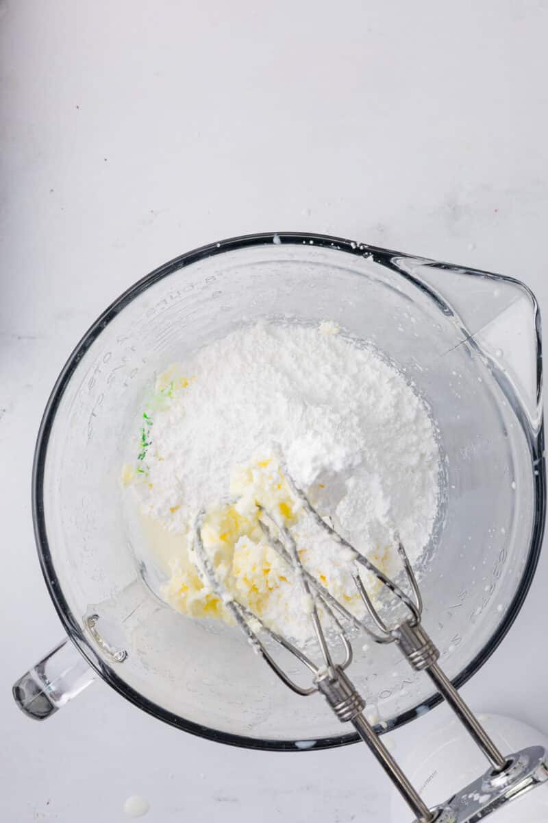 powdered sugar butter and half and half in a batter bowl