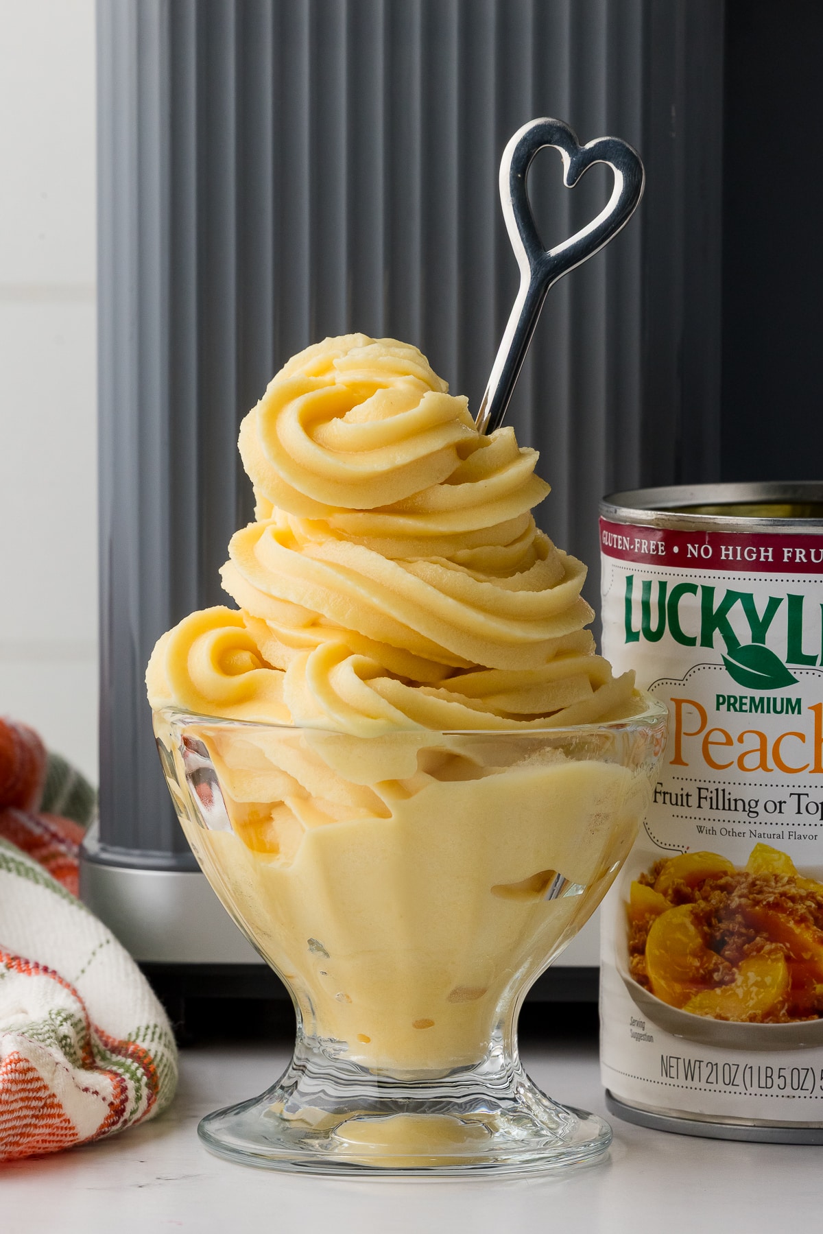 peach sorbet in a glass sundae cup and luckyleaf peach fruit filling can