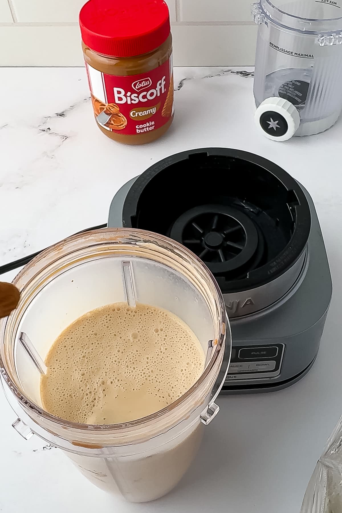 biscoff ice cream mixture in a ninja blender on a white counter