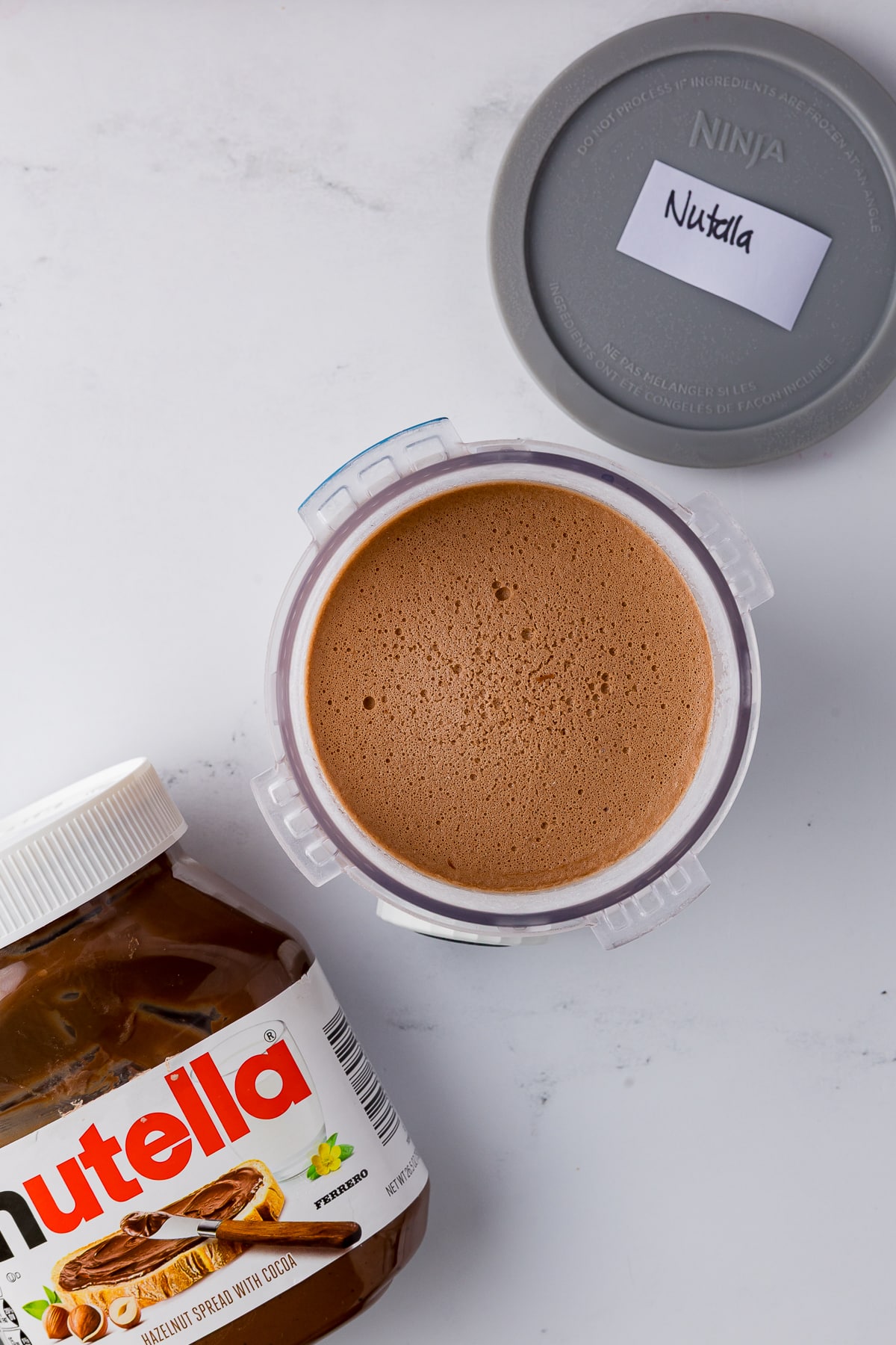 frozen Nutella Ice cream in a ninja swirl by creami pint jar