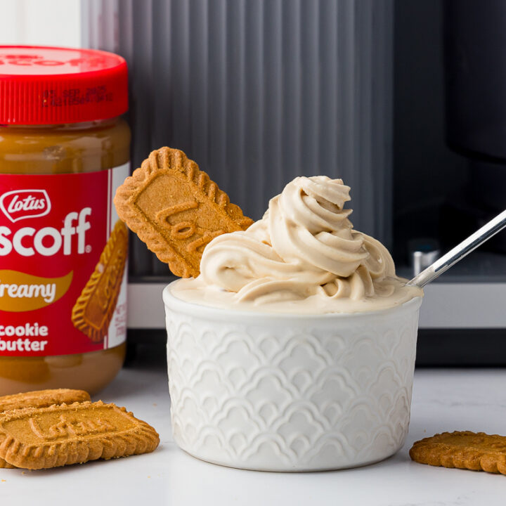 biscoff cream cookie butter jar with biscoff cookies and biscoff ice cream in front of a ninja swirl by creami