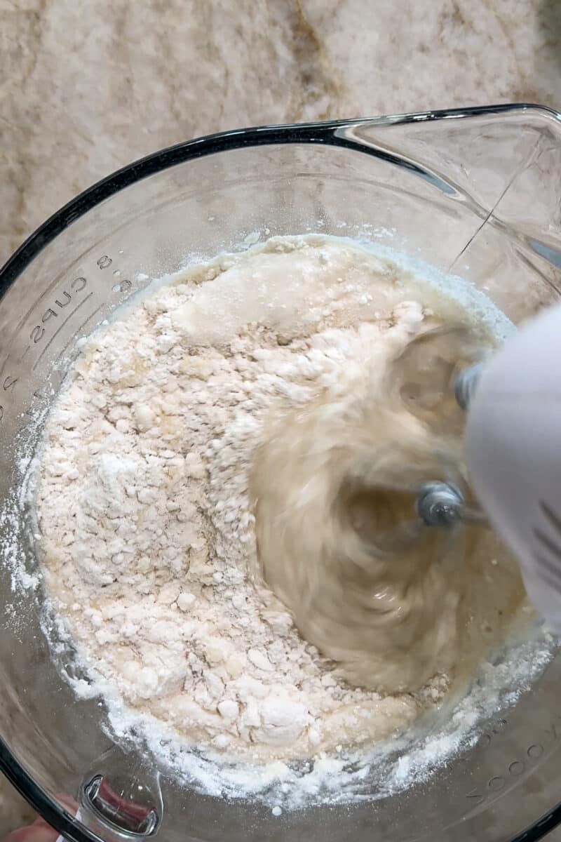dry white cake mix in a batter bowl