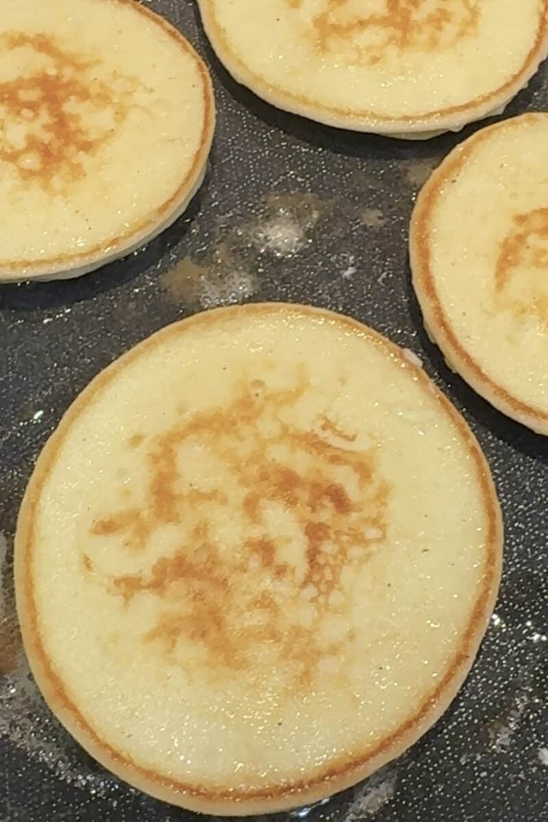 high protein pancakes made with cottage cream in a hexclad frying pan