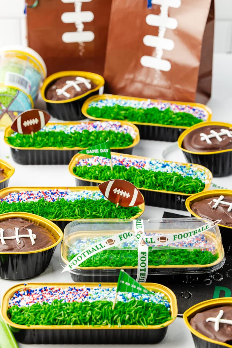 mini loaf pans made to look like a stadium filled with people rooting for the seattle seahawks and new england patriots