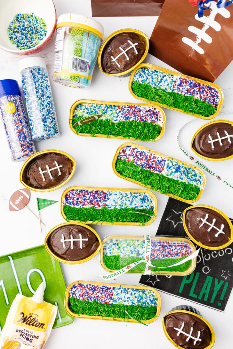 mini loaf pans made to look like a stadium filled with people rooting for the seattle seahawks and new england patriots