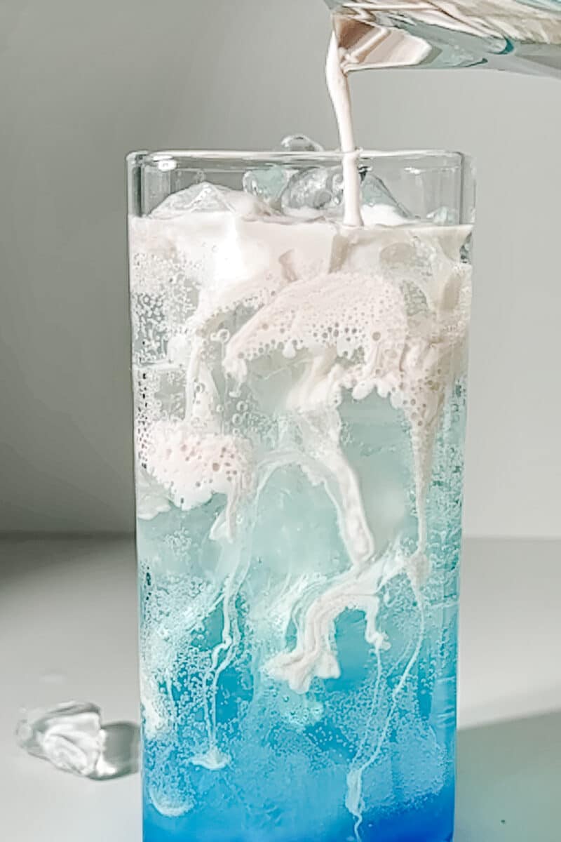 pouring cream into glass