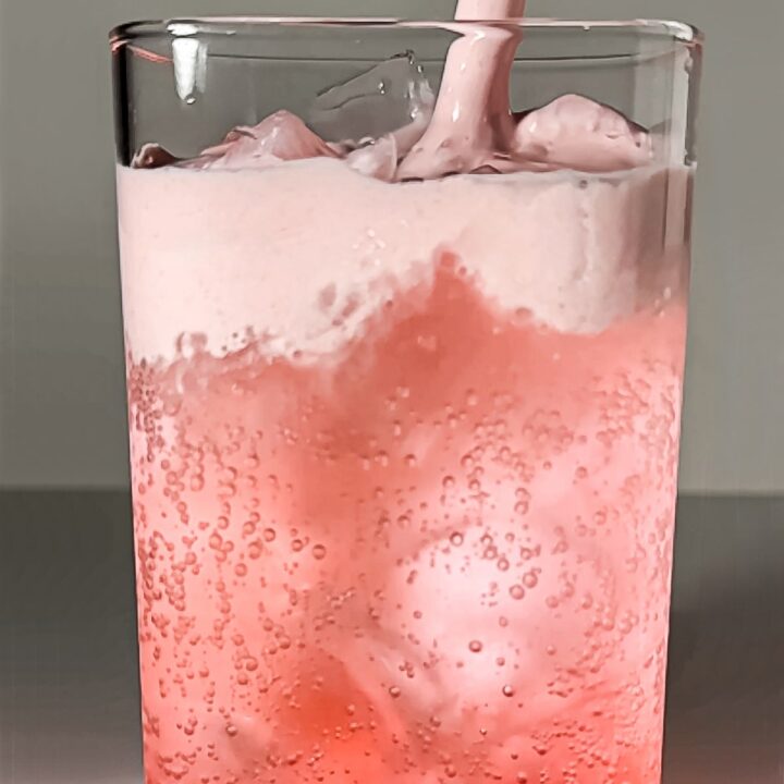 Strawberry Peach Lemon Lime Dirty Soda blends crisp citrus fizz with sweet fruit syrups and a luxurious, homemade strawberry cold foam.